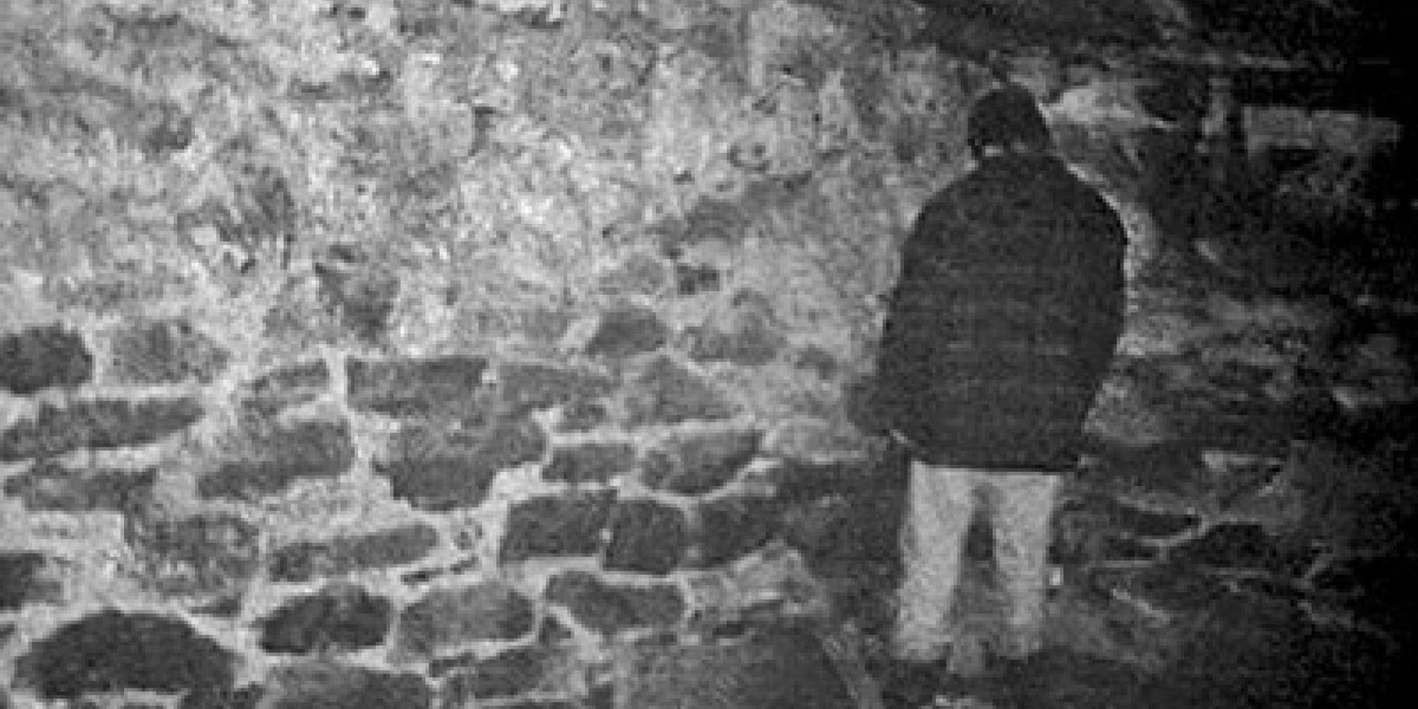 A man turning away from the Blair Witch